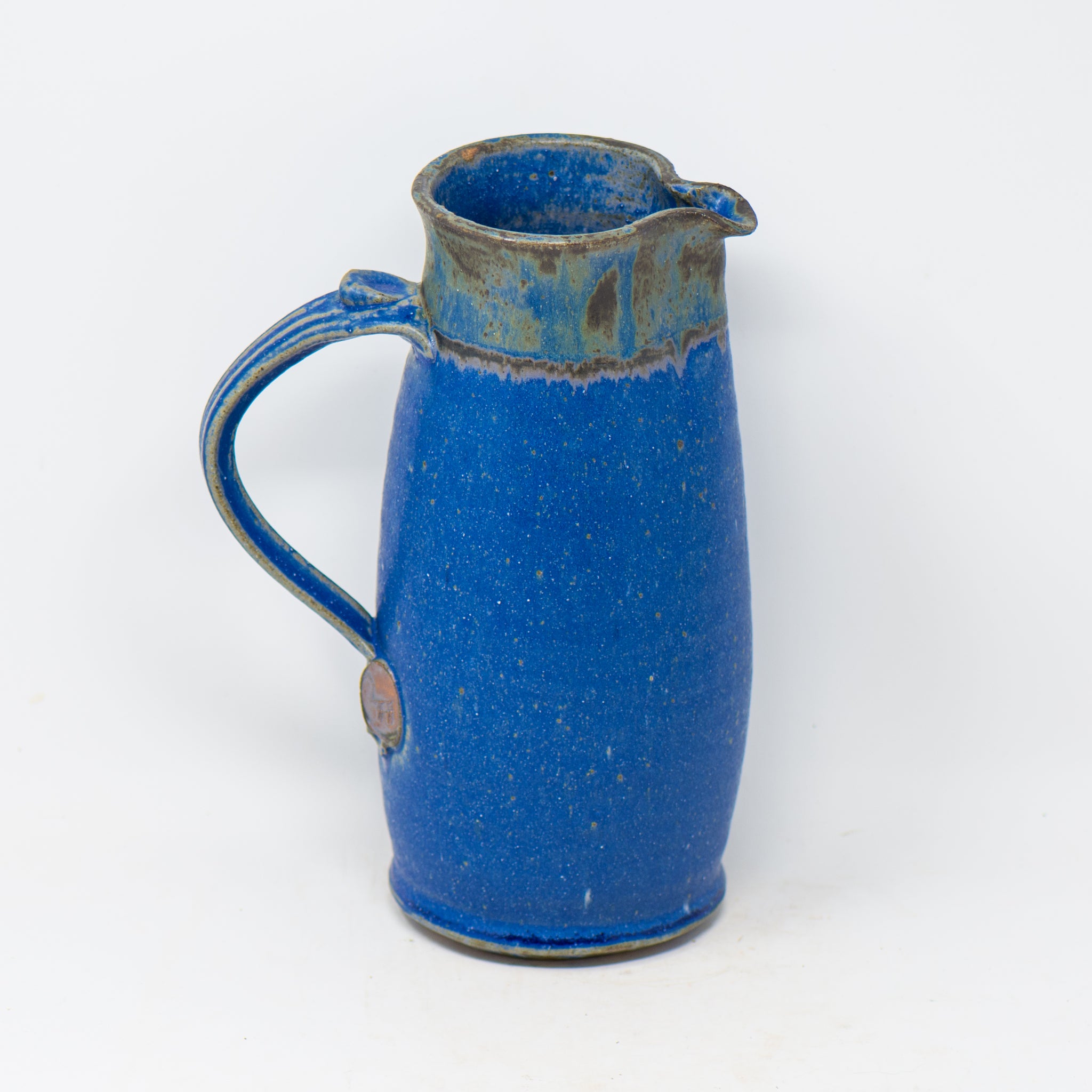 https://www.tokheim-stoneware.com/cdn/shop/files/Tokheim-Stoneware-Tall-Pitcher-Blue_2048x2048.jpg?v=1691789450