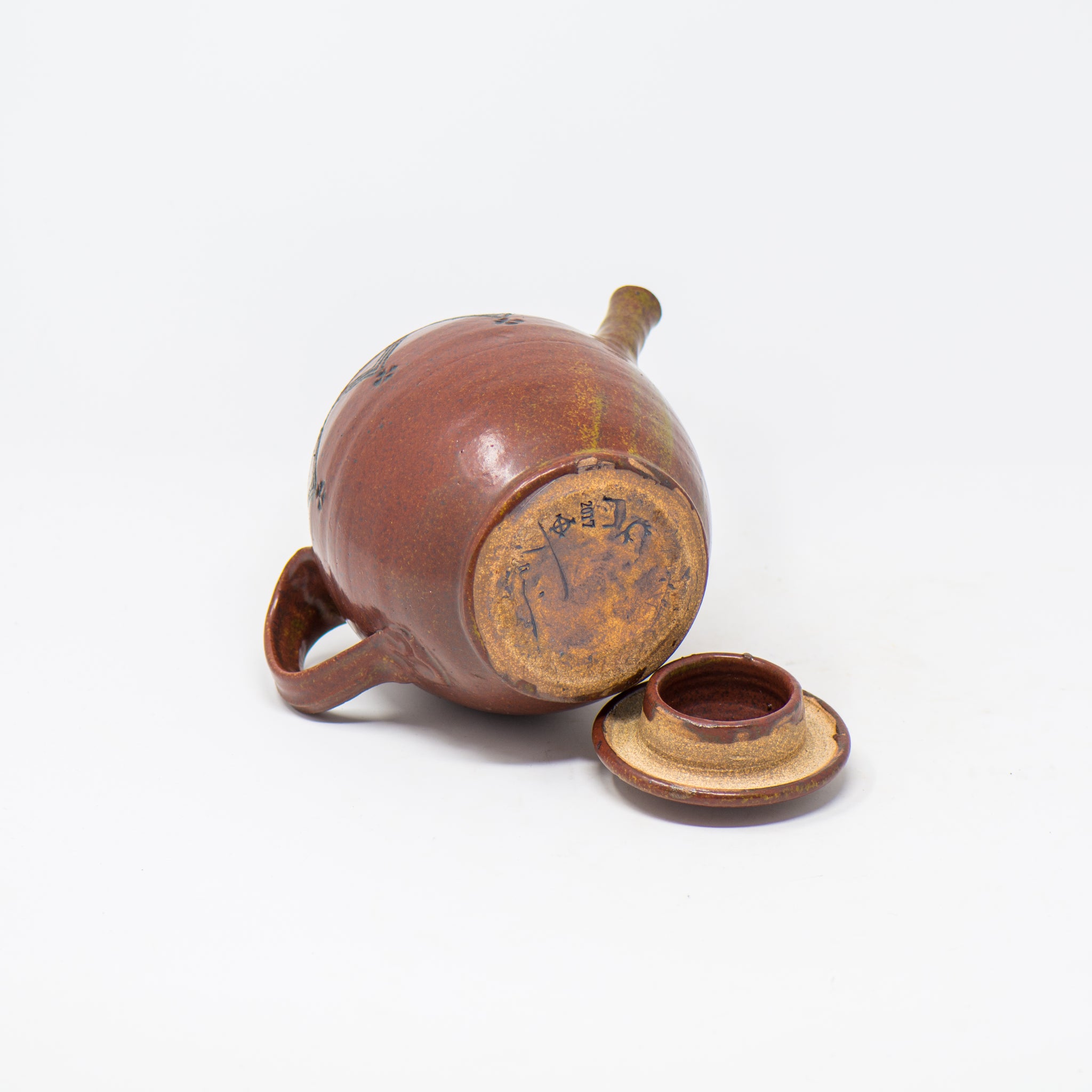 Red Handled Tea Pot